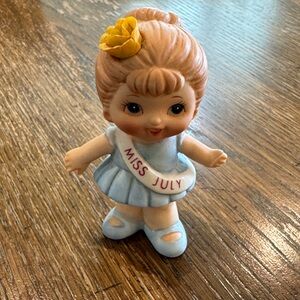 Miss July Figurine with Yellow and Blue Dress